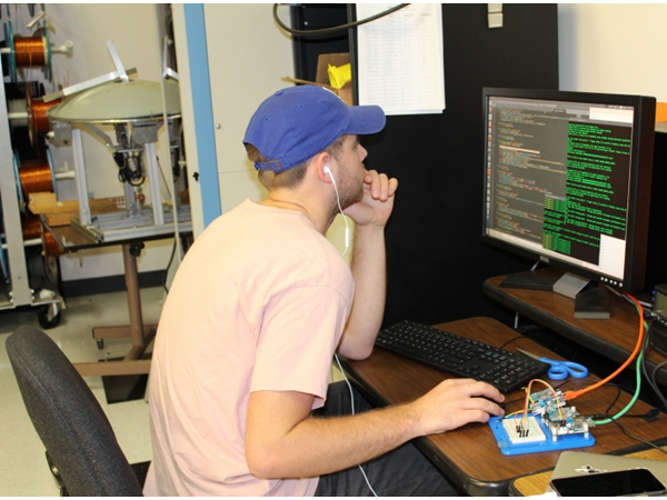Student Working in front of a Computer