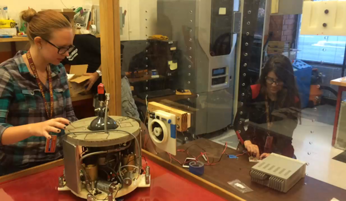 rpo-2 Students Working Inside Glass Hood with Apparatus