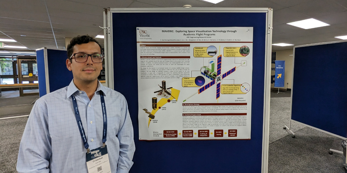 Person next to research poster