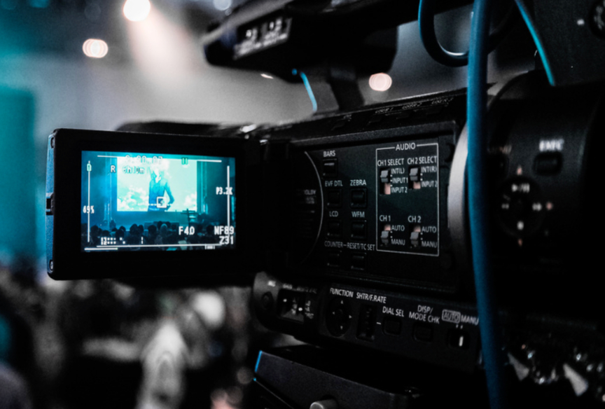 Close-up of professional video camera recording an event