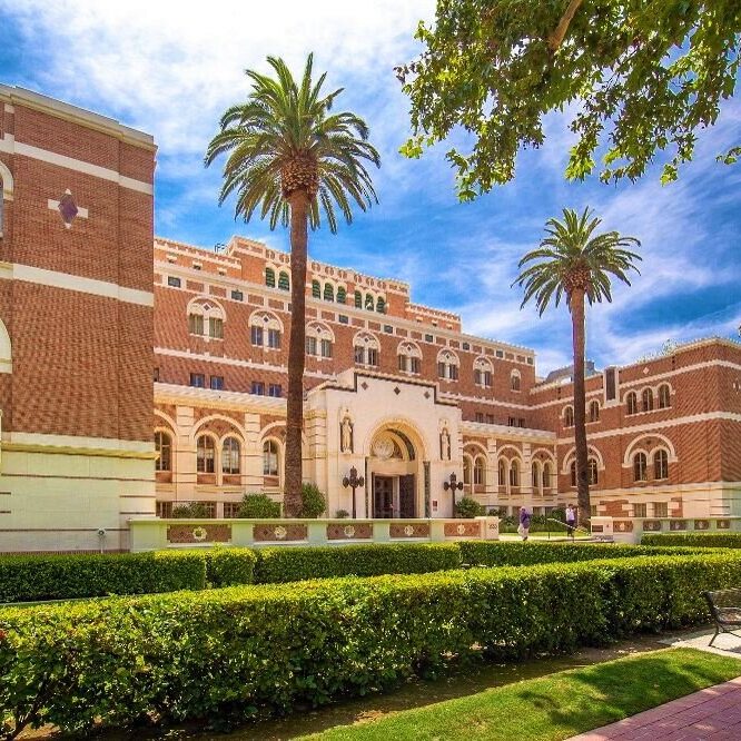 USC Building Made of Bricks with Bushes in the Foreground