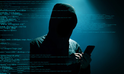 Hacker trying to break into a phone