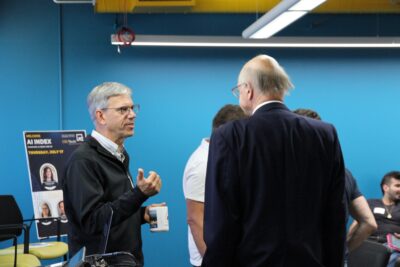 Craig Knoblock speaking to Ray Perrault