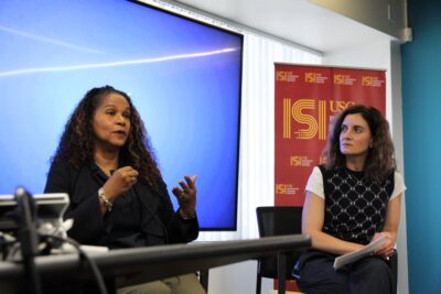 Karina Montilla Edmonds speaking at the panel