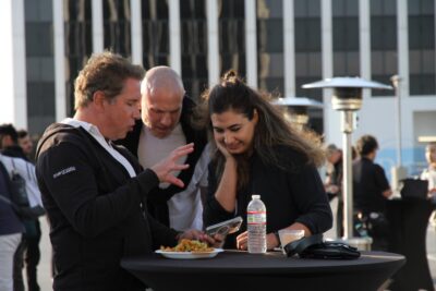 Karl Jacob migling with guests