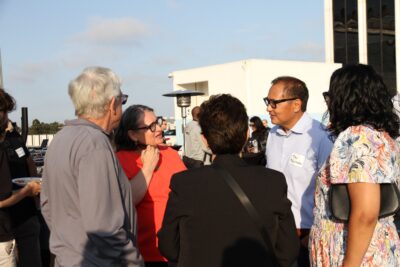 Guests speaking at party