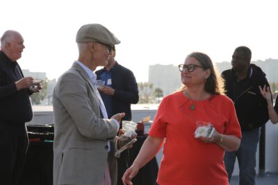 Yolanda Gil speaking with atendee