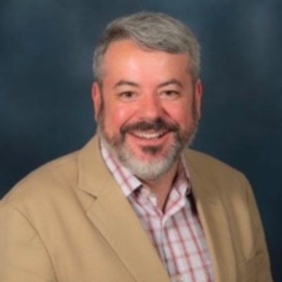 Dr. Justin St. P. Walsh