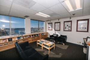 Modern office interior with seating area and workspaces