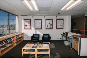 Office interior with modern furniture and workspaces