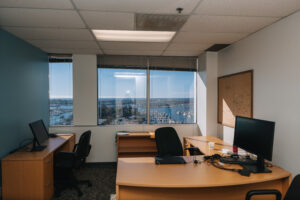 Modern office interior with workspaces and seating area